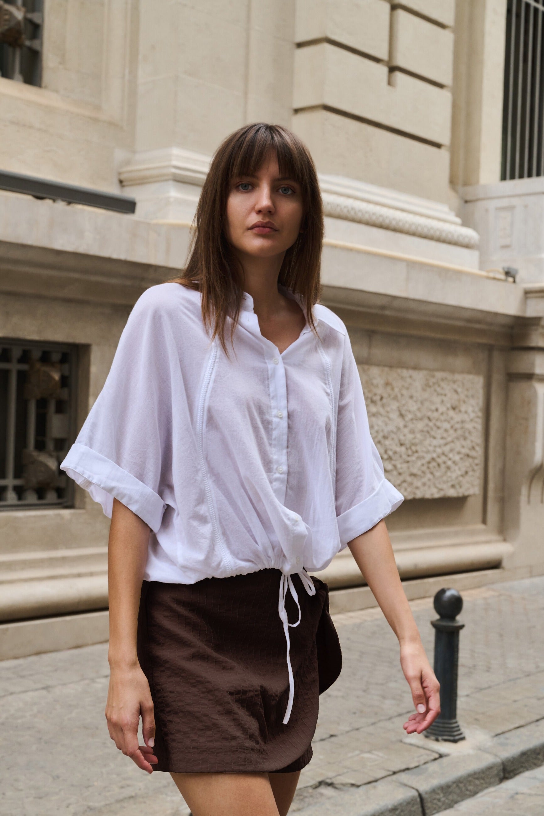 Bluse mit geflochtenen Einsätzen