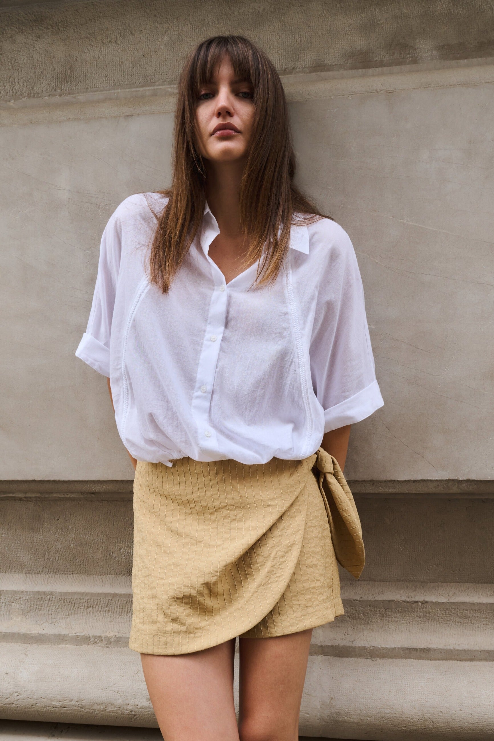 Bluse mit geflochtenen Einsätzen