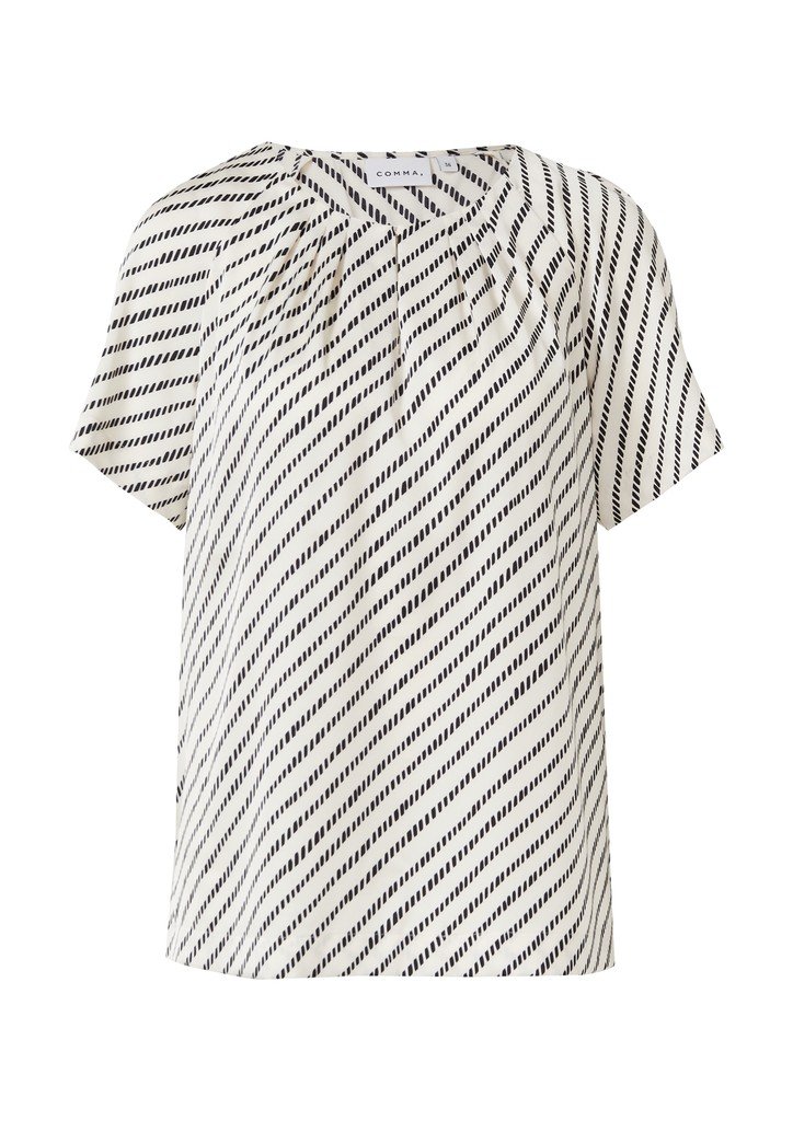 Witte blouses met komma-motief
