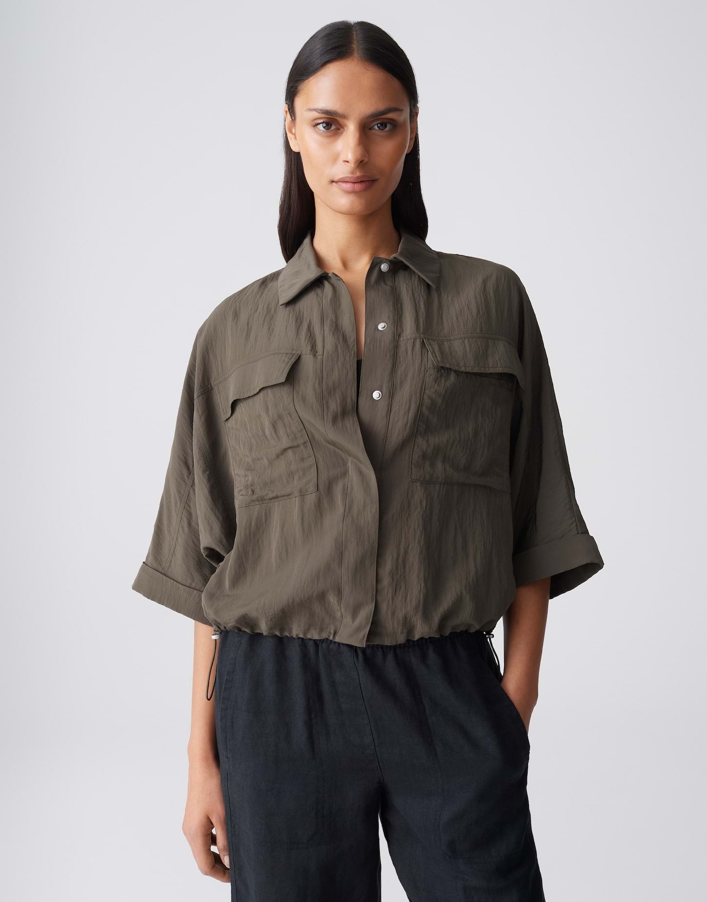 Crashbluse mit Utility-Details